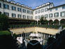Courtyard of Hotel Four Seasons, Via Gesu 8, located in old cloister.