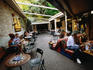 Having apertivo at Tratoria Toscana, Corso di Porta Ticinese.