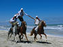 Horse riding acrobatics at traditional Berber wedding.