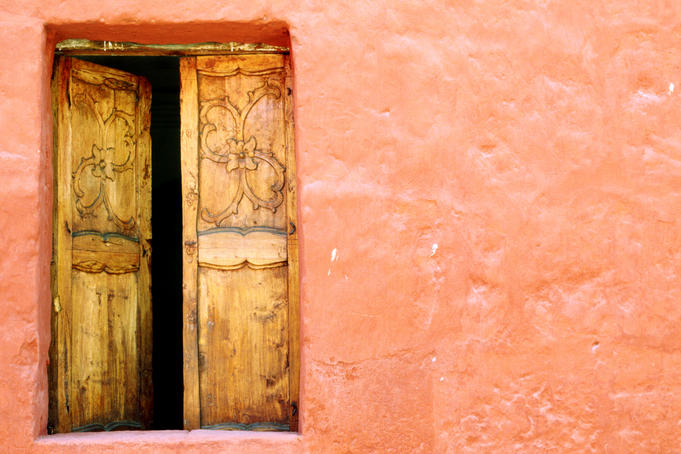 Carved door and painted facade at Monastery of Santa Catalina, Arequipa