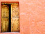 Carved door and painted facade at Monastery of Santa Catalina, Arequipa