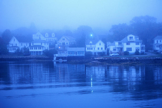 Boothbay Harbor, houses in morning fog.