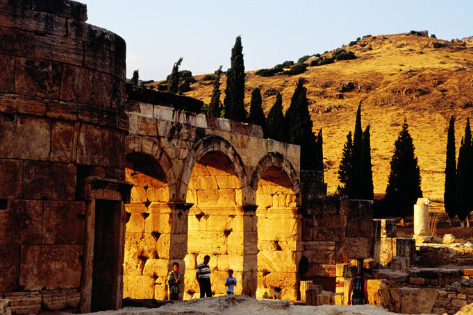 Hierapolis ruins near hillside.