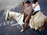 Gardians horseman and woman at feria.