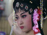 Chinese opera performer preparing for show at Sheng Hong Temple.
