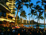 Sunset Happy Hour at Dukes Canoe Club bar, Waikiki Beach.