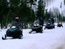 Snow-mobiling in convoy.
