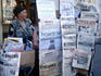 Communist selling left-wing news outside Gostiny Dvor.