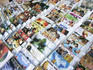 Pirate DVDs and music CDs for sale.