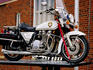 Police motorcycle outside Sturgis Motorcycle Museum.