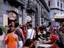 Street cafe and pedestrians in Piazza Trento e Trieste.