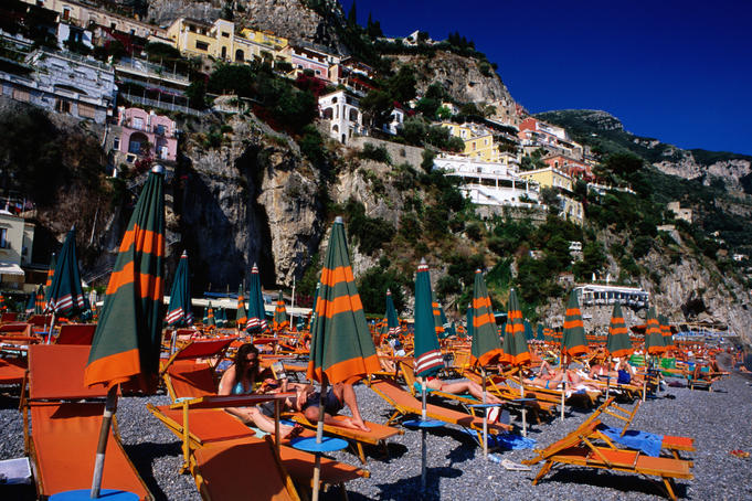 Umbrellas on beach and deck chairs on Spiaggia Grande.