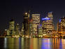 City skyline and Brisbane River at night.