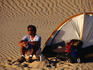 Man camping at Imperial Sand Dunes.