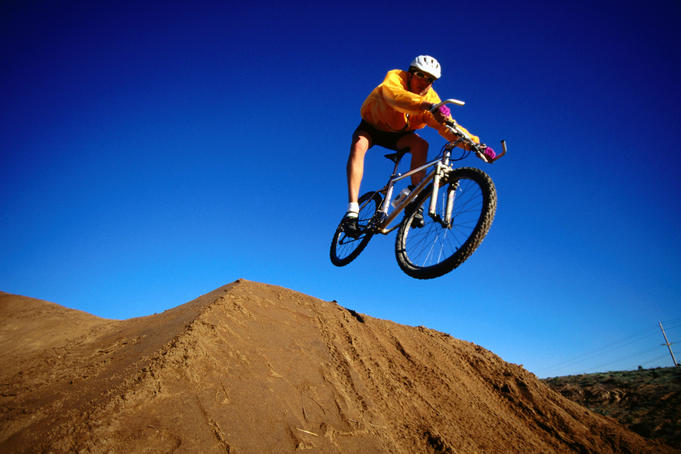 Mountain biker jumping at Solana Beach.