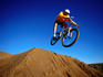 Mountain biker jumping at Solana Beach.