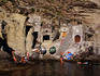 Swimmers at old stone boat sheds.