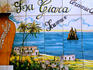 Hand painted ceramic tiled shop sign.