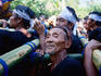 Old man carrying cremation tower, cremation ceremony.