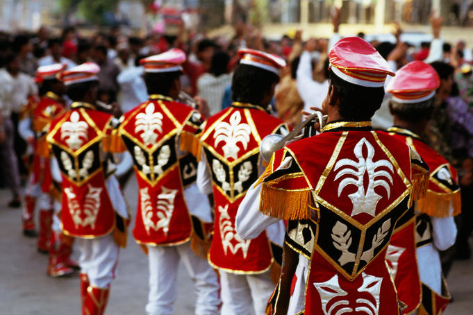 Musicians in costume for wedding procession.