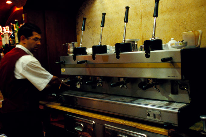 Coffee machine with hand pumps.