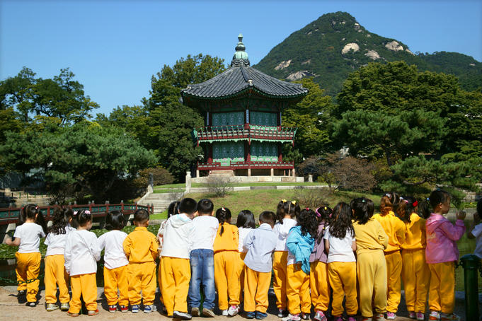 Gyeonbokgung Palace, children at Hyangwonjeong Pavilion.