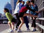 Women runners stretching, Boston