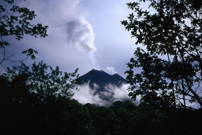 Arenal Volcano belching plume of smoke and ash.
