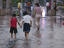 Children in rain, Shànghai