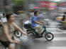 Two wheel traffic at the intersection of Central Sichuan and Nanjing Lu.
