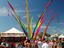 Stalls and crowds at the Byron Bay market.