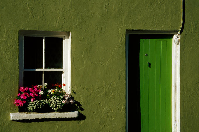 Green cottage door and window detail.