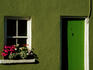 Green cottage door and window detail.