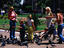 Family with children feeding pigeons at Plaza de Mayo.