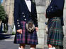 A couple of lads dressed for a wedding in traditional tartan kilts, at St Marchar's Cathedral