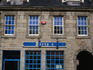 A handful of locals sitting outside a pub in Castlegate