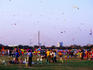 People flying kites at Sanam Luang (Royal Field).