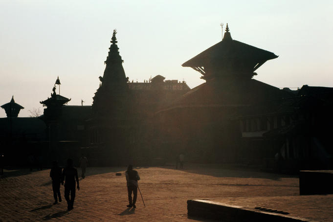 Temples in Durbar Square silhouetted at sunset.