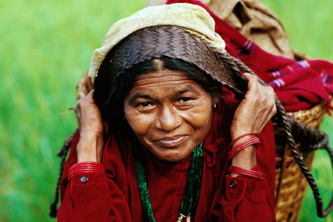 Portrait of Tamang woman carrying goods to market.