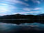 Annapurna Himal reflected in Phewa Lake at sunrise.