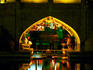 Teahouse under arch of Si-o-Seh Bridge reflected in Zayandeh River.