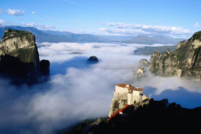 Varvara Rousanour in foreground, and Nikolaou Anapafsa Monasteries in morning fog.