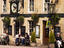 People drinking outside the Golden Pheasant Inn.