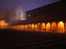 Basilica di San Francesco in fog at night.