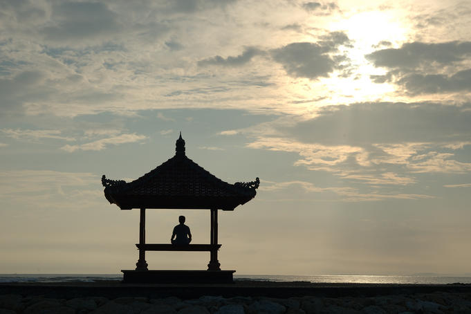 Silhouette of person on beach at Nusa Dua.
