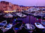 Boats in port and waterfont buildings.