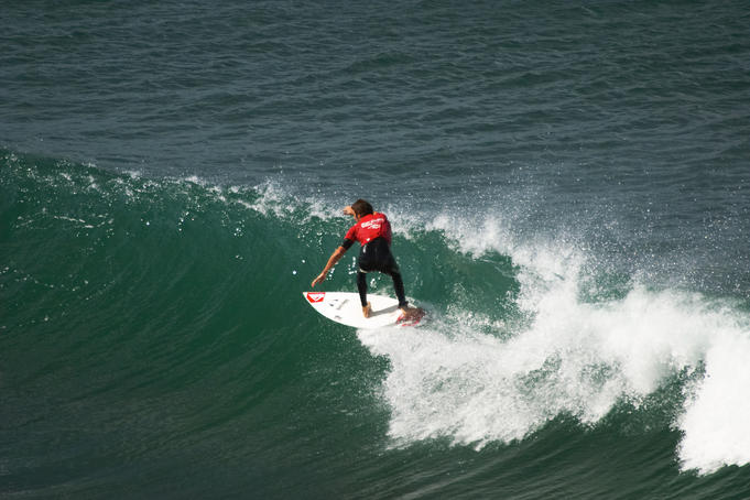 Man surfing at Bells Beach, near Torquay, Great Ocean Road.