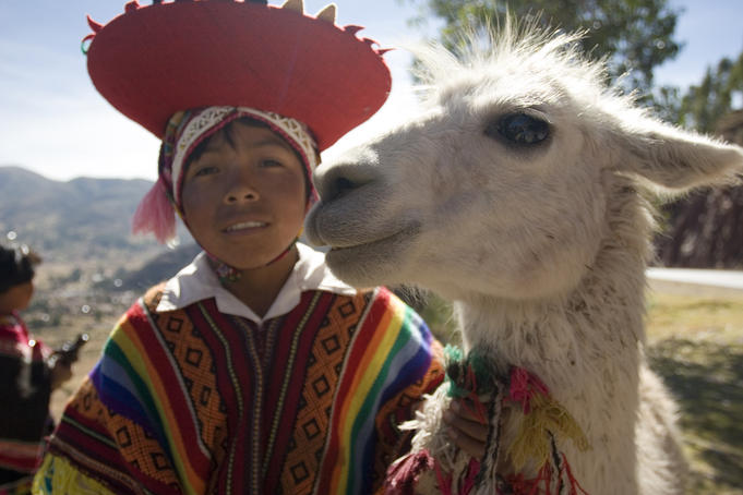 Local with llama along road from Cusco to Pisac.