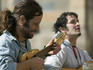 Street musicians playing for tips.
