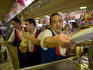 Bartenders at work in busy afternoon in Tapas bar.